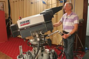 Former BBC camera operator Rex Palmer at the controls of an EMI 2001 colour broadcast television camera. Photo by Nick Gilbey.