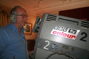 Former BBC camera operator Dave Taylor at the controls of a colour broadcast television camera